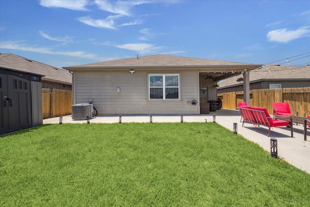 21022 Solstice Point Dr, Hockley, TX 77447 - rear view of property with a patio, a ceiling fan, central air condition unit, and a shingled roof