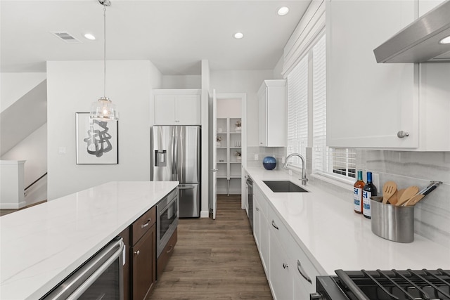 2706 Grand Fountains Dr Unit B, Houston, TX 77054 - kitchen featuring stainless steel appliances, range hood, a sink, wine cooler, and dark wood-style flooring