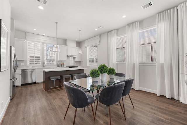 2706 Grand Fountains Dr Unit B, Houston, TX 77054 - dining area with dark wood-style flooring, baseboards, and recessed lighting