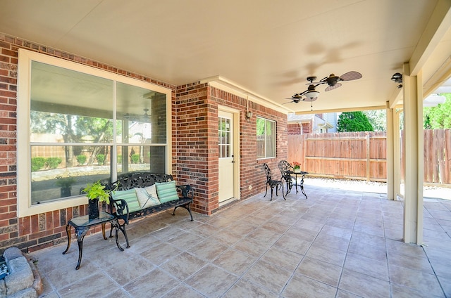 18106 Rileybrook Cir, Houston, TX 77094 - view of patio featuring fence and ceiling fan