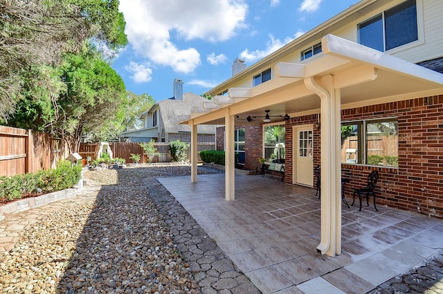 18106 Rileybrook Cir, Houston, TX 77094 - view of patio featuring a fenced backyard and a ceiling fan