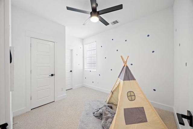 322 Neyland St, Houston, TX 77022 - rec room featuring carpet flooring, ceiling fan, and baseboards
