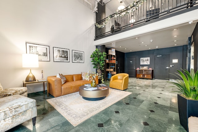 1120 Texas St Unit 7D, Houston, TX 77002 - living room featuring a high ceiling and recessed lighting