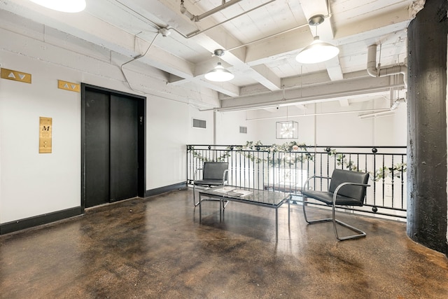 1120 Texas St Unit 7D, Houston, TX 77002 - interior space featuring beamed ceiling, finished concrete flooring, baseboards, and elevator