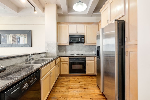 1120 Texas St Unit 7D, Houston, TX 77002 - kitchen featuring black appliances, a sink, beam ceiling, light wood finished floors, and light brown cabinets