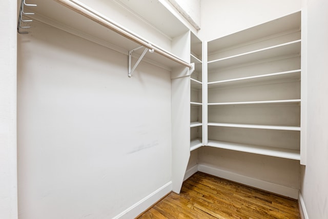 1120 Texas St Unit 7D, Houston, TX 77002 - spacious closet featuring wood finished floors