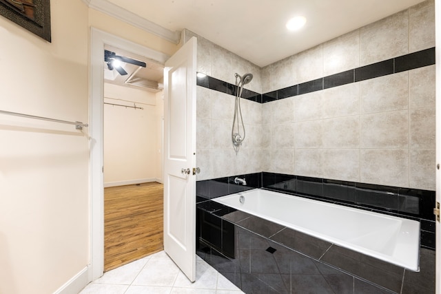 1120 Texas St Unit 7D, Houston, TX 77002 - bathroom with tiled shower / bath combo, tile patterned floors, recessed lighting, and baseboards