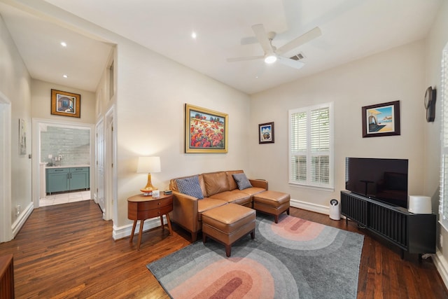 1710 Spring St, Houston, TX 77007 - living room with a ceiling fan, dark wood-type flooring, baseboards, and recessed lighting