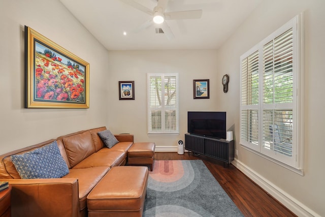 1710 Spring St, Houston, TX 77007 - living area featuring dark wood finished floors, ceiling fan, and baseboards