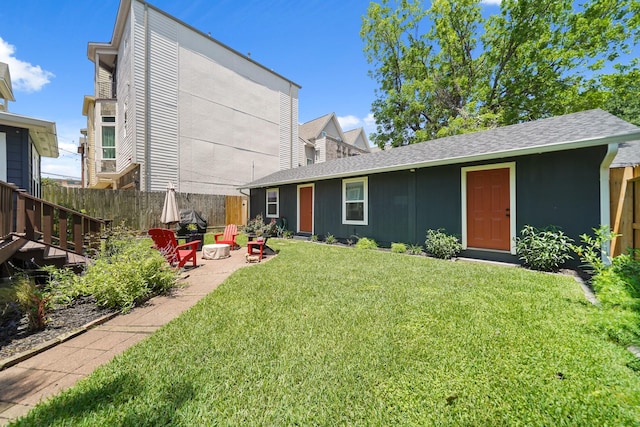 1710 Spring St, Houston, TX 77007 - rear view of house with a patio area and a shingled roof