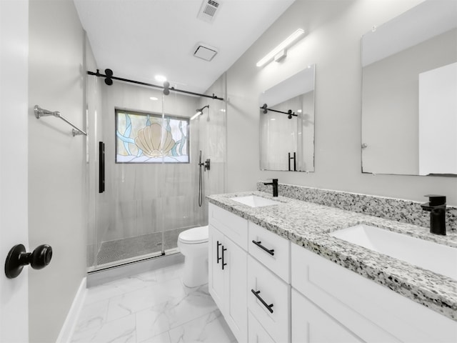 full bath with a shower stall, toilet, marble finish floors, double vanity, and baseboards