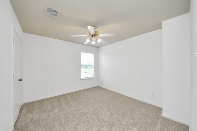 13114 Oak Ledge Dr, Houston, TX 77065 - carpeted empty room with ceiling fan and baseboards