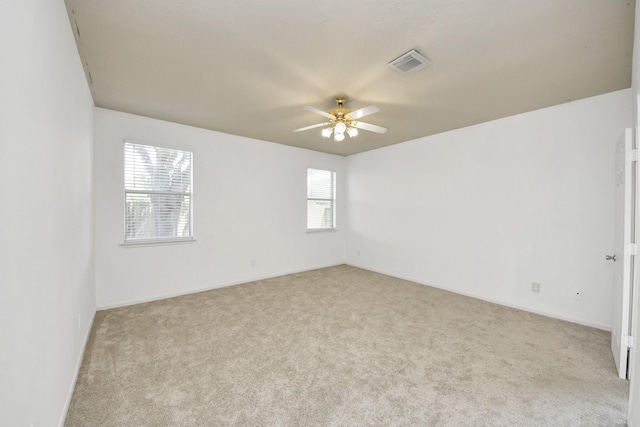 13114 Oak Ledge Dr, Houston, TX 77065 - carpeted spare room with a ceiling fan and baseboards