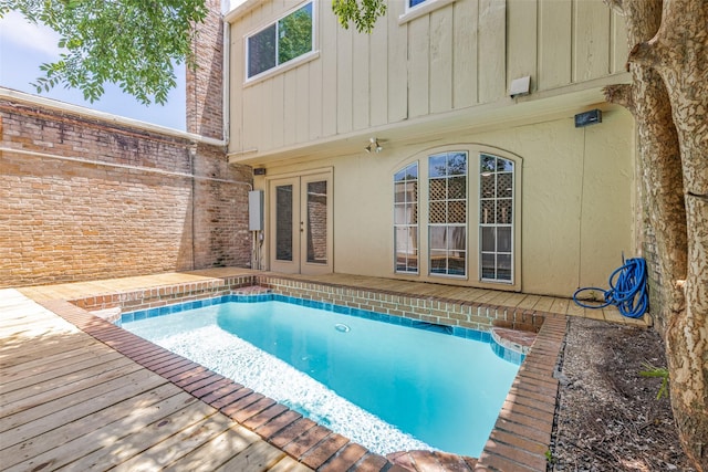 10816 Briar Forest Dr Unit 33, Houston, TX 77042 - swimming pool with french doors and a deck