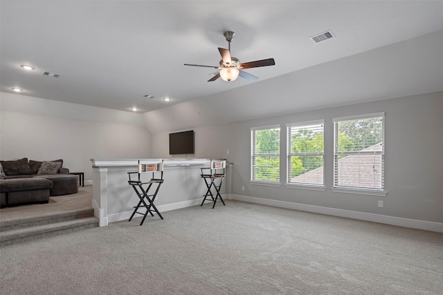 carpeted living area with baseboards, a ceiling fan, and recessed lighting