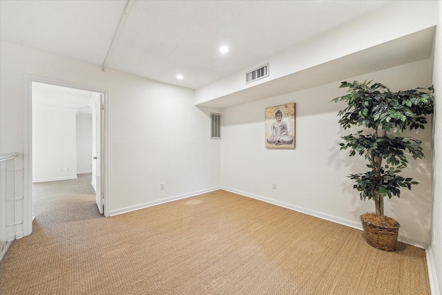finished below grade area featuring carpet floors, recessed lighting, and baseboards