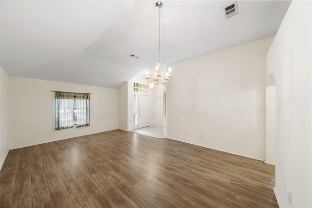 17922 Cypress Valley Ln, Cypress, TX 77429 - spare room featuring a chandelier, lofted ceiling, and wood finished floors