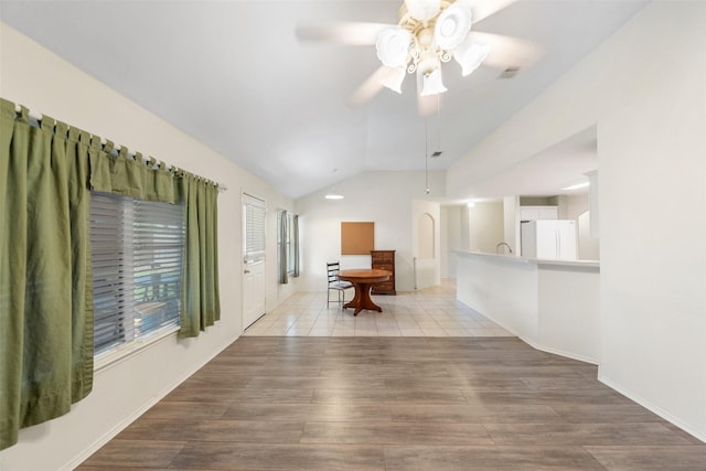 17922 Cypress Valley Ln, Cypress, TX 77429 - living area featuring vaulted ceiling, ceiling fan, and wood finished floors