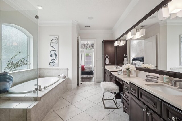 3109 Mcculloch Cir, Houston, TX 77056 - full bath featuring healthy amount of natural light, double vanity, connected bathroom, a bath, and crown molding