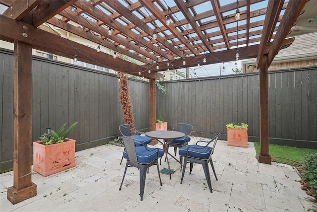3109 Mcculloch Cir, Houston, TX 77056 - view of patio featuring a fenced backyard, outdoor dining space, and a pergola