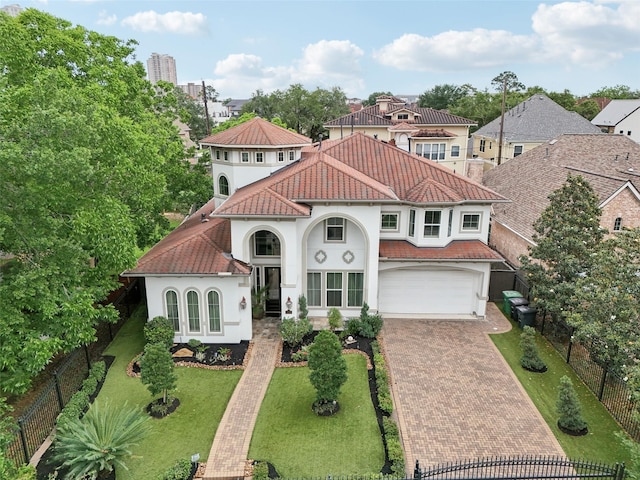 3109 Mcculloch Cir, Houston, TX 77056 - mediterranean / spanish home featuring stucco siding, decorative driveway, a tile roof, and a garage