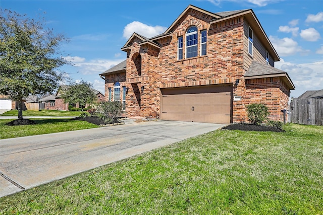 traditional home featuring brick siding, a garage, driveway, and roof with shingles