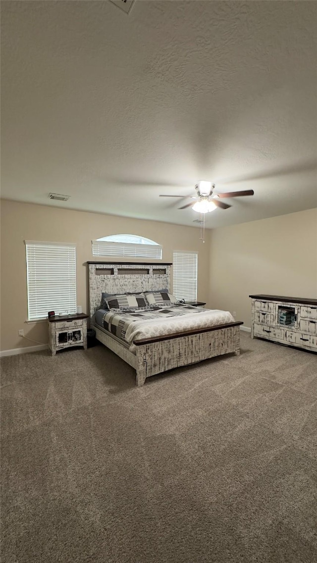 6514 Evening Rose Ln, Katy, TX 77449 - bedroom featuring carpet flooring, ceiling fan, and multiple windows