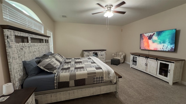 6514 Evening Rose Ln, Katy, TX 77449 - carpeted bedroom featuring a ceiling fan and baseboards