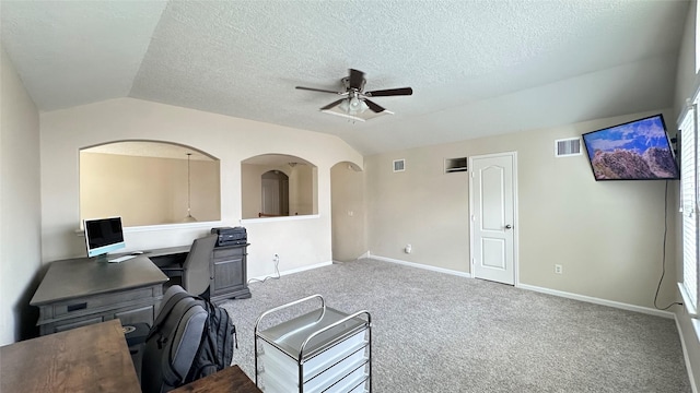 6514 Evening Rose Ln, Katy, TX 77449 - office area with vaulted ceiling, a ceiling fan, baseboards, carpet floors, and a textured ceiling