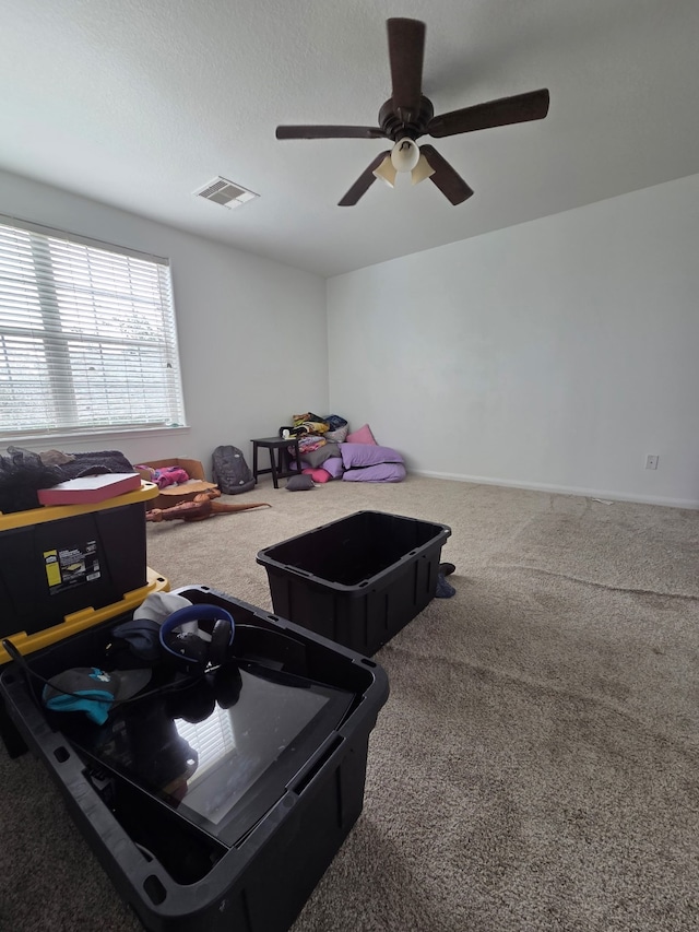 9914 Pearl Creek Ln, Rosharon, TX 77583 - game room with carpet flooring and ceiling fan