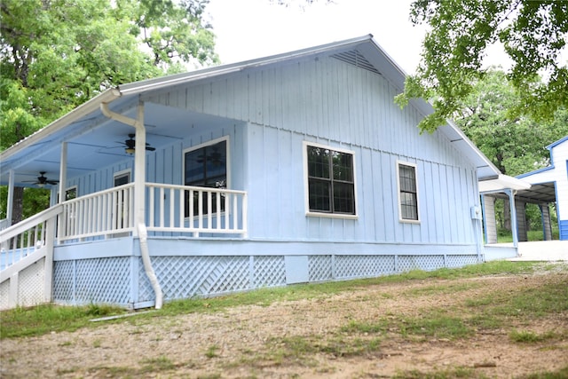 112 Lcr 902, Jewett, TX 75846 - view of home's exterior with a ceiling fan, a porch, and board and batten siding
