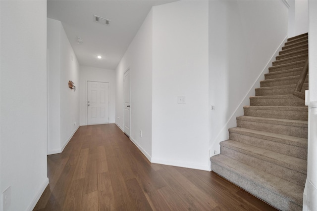 23431 Wrexham St, Spring, TX 77373 - corridor with stairway, dark wood finished floors, baseboards, and recessed lighting