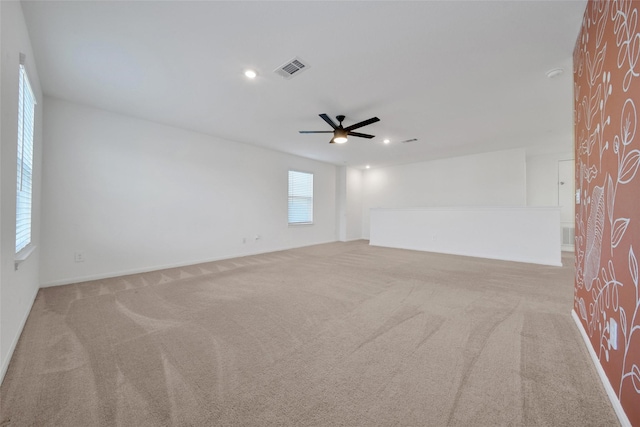 23431 Wrexham St, Spring, TX 77373 - carpeted spare room featuring a ceiling fan, recessed lighting, and baseboards