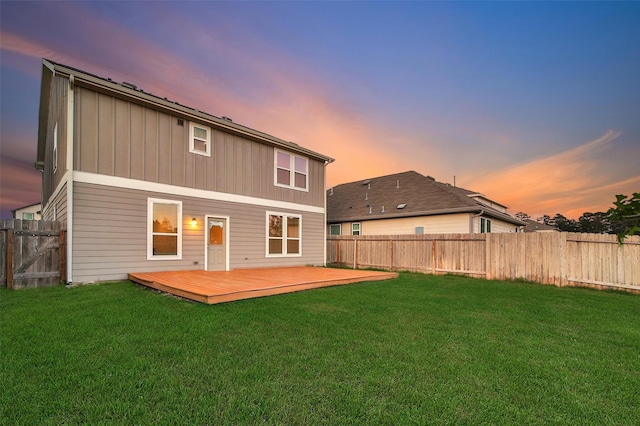 23431 Wrexham St, Spring, TX 77373 - back of property at dusk featuring a deck