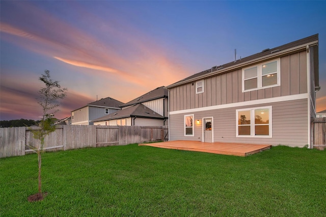 23431 Wrexham St, Spring, TX 77373 - rear view of property with board and batten siding and a deck