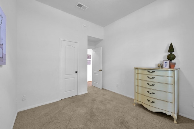 bedroom featuring carpet flooring and baseboards