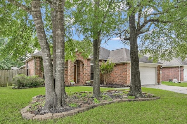 view of front facade with brick siding, driveway, a garage, and roof with shingles