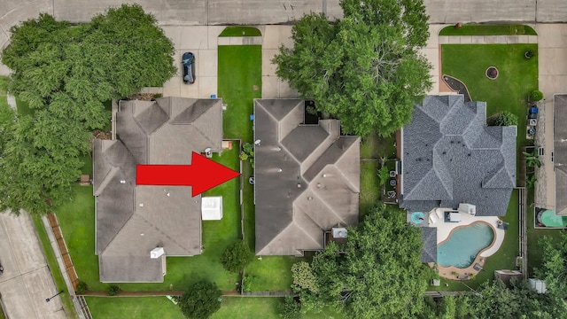 drone / aerial view of a pool area