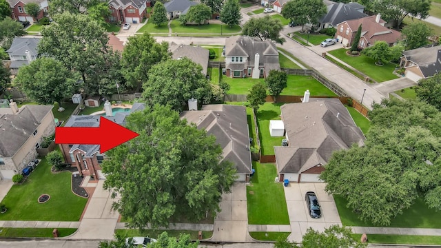 aerial overview of property's location with nearby suburban area
