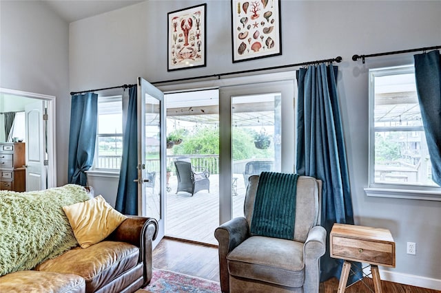 living room with wood finished floors and baseboards