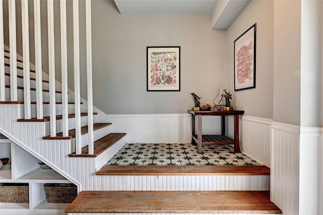 stairs with wainscoting