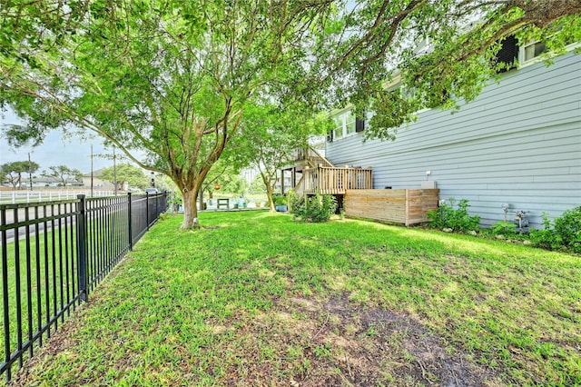 view of yard featuring a deck