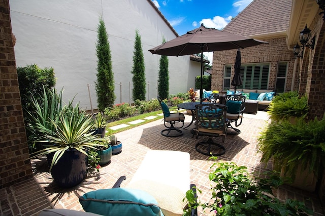 view of patio featuring an outdoor hangout area and outdoor dining space