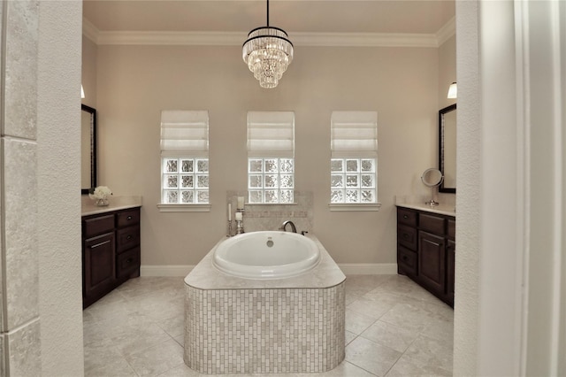 full bath featuring vanity, a bath, healthy amount of natural light, and ornamental molding