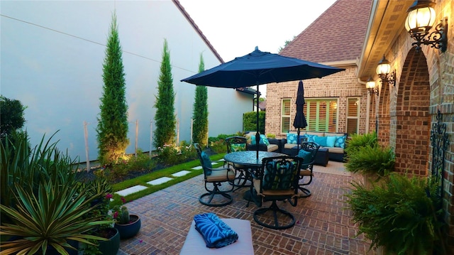 view of patio / terrace with an outdoor hangout area and outdoor dining area