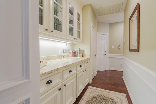 34 S Taylor Point Dr, The Woodlands, TX 77382 - bar area featuring dark wood-type flooring
