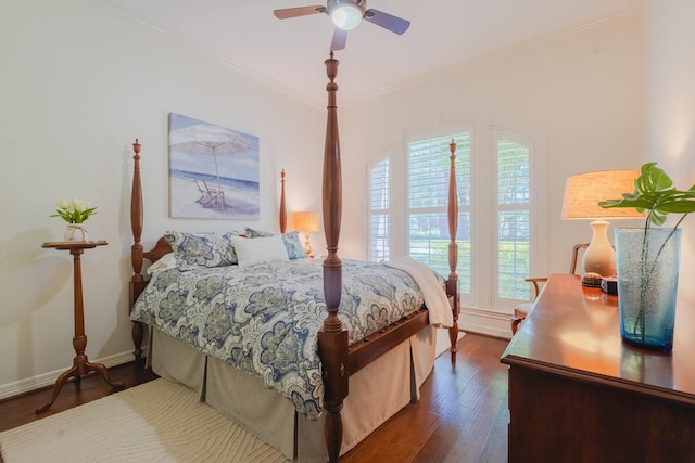 34 S Taylor Point Dr, The Woodlands, TX 77382 - bedroom with crown molding, dark wood-style floors, baseboards, and a ceiling fan