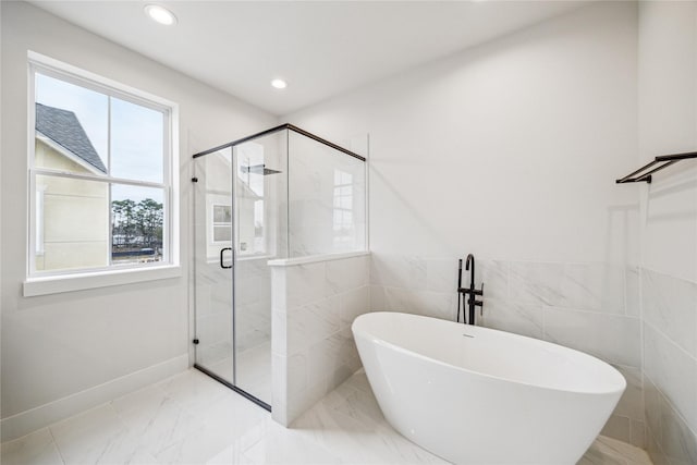 5502A Wheatley St, Houston, TX 77091 - bathroom with a soaking tub, a stall shower, recessed lighting, and marble finish floors