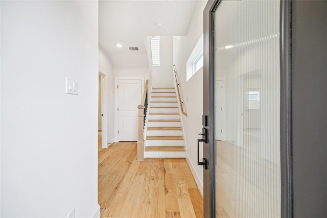 5502A Wheatley St, Houston, TX 77091 - foyer entrance featuring light wood-style flooring, baseboards, stairs, and recessed lighting