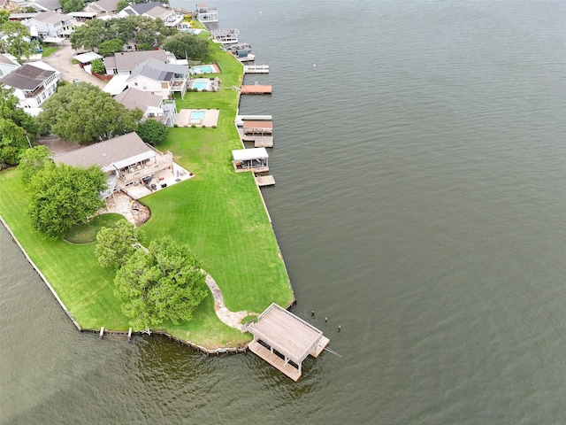 79 Lakeview Vlg, Conroe, TX 77356 - aerial view of property and surrounding area with a large body of water and nearby suburban area